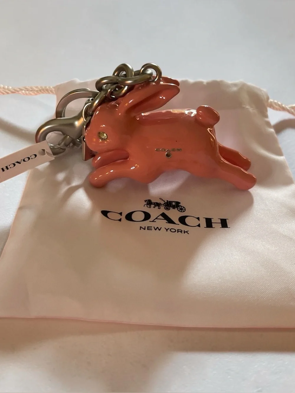 NWT coach, pink, solid bunny, bag charm with clip
